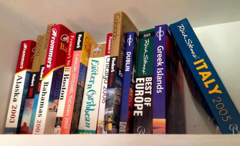 guide-books-on-shelf-three