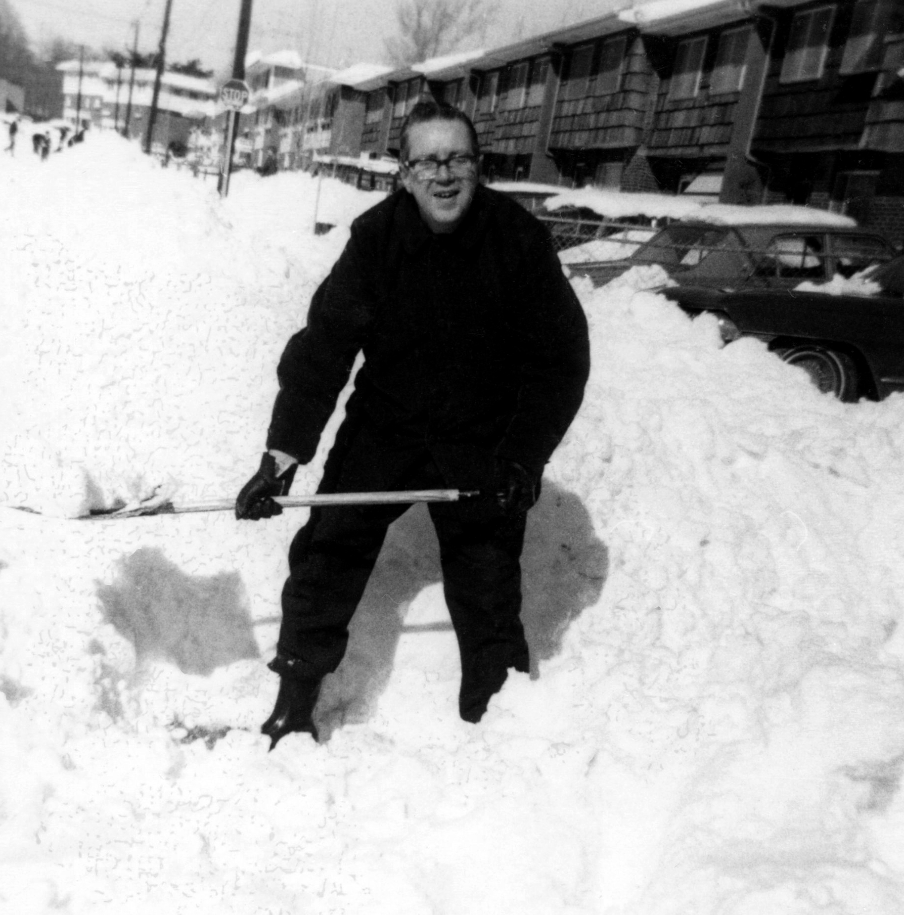 1970's New York man shoveling snow winter road trip