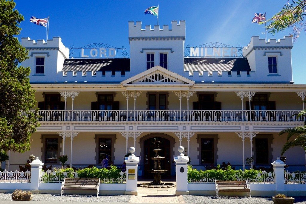 exterior of the lord milner hotel seen during luxury train travel and described in rovos rail review