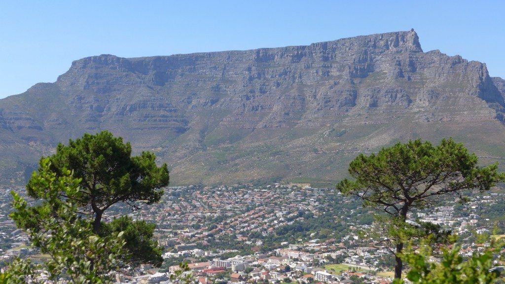 Hiring a tour guide will help you see sights from different vantage points like this view of Table Mountain in Cape Town, South Africa