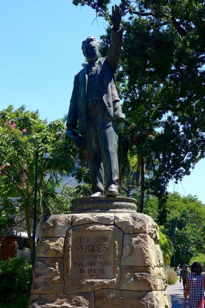 Hire a local tour guide to learn about the history of your destination like the controversy associated with South Africa's Cecil Rhodes