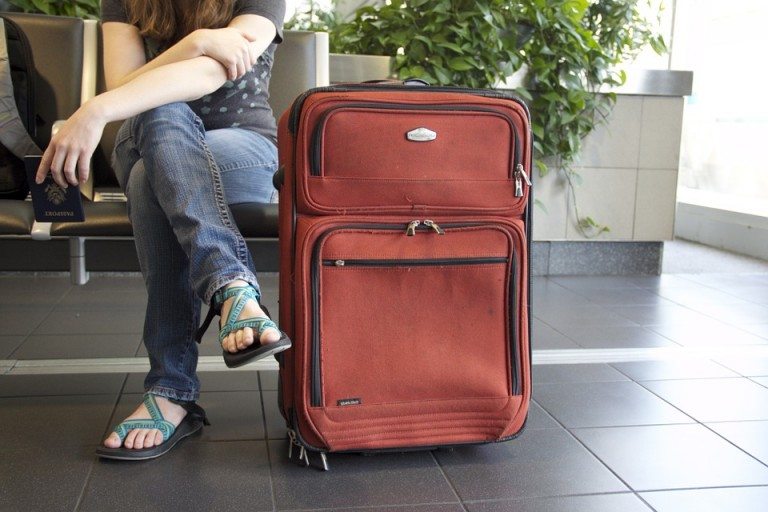 woman-suitcase-sandals