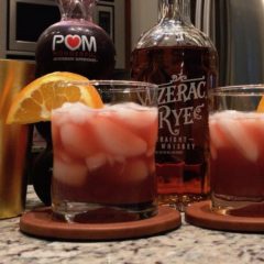 whiskey cocktail garnished with an orange slice for Father's Day