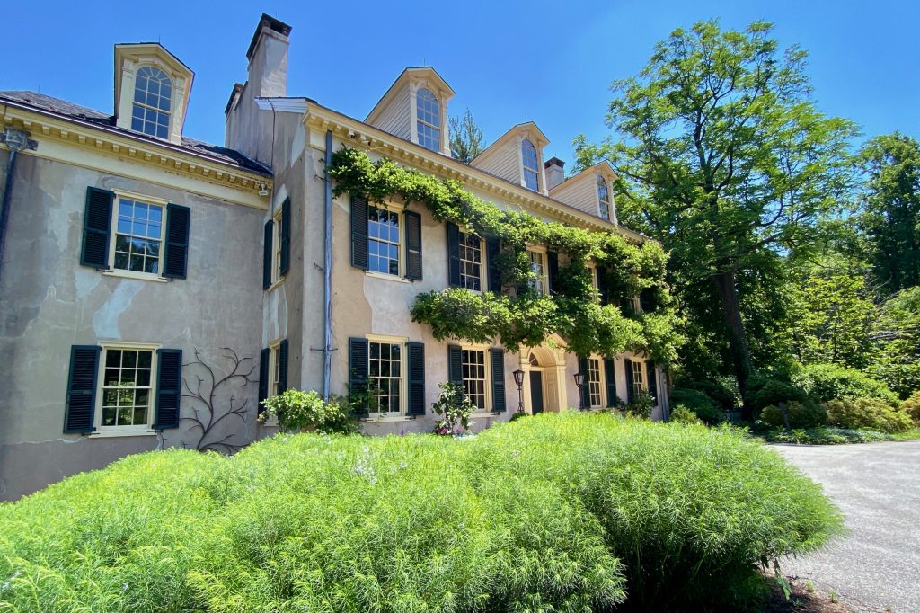 Facade of the Eleutherium Mills house on the grounds of the Hagley Museum and Library, one of the fun things to do in Delaware.