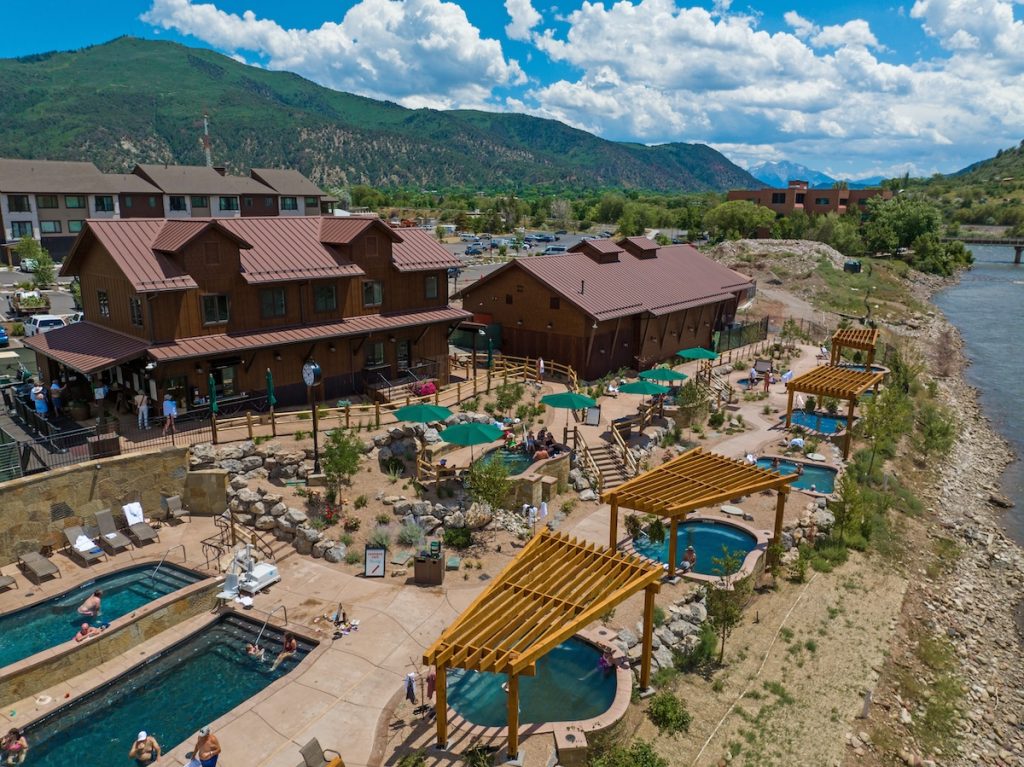 Aerial view of the Iron Mountain Hot Springs, one of the outdoor activities available as part of the Peak Pursuits program