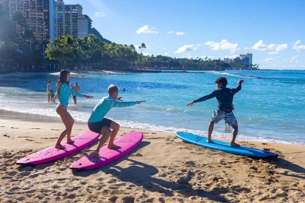 A surf lesson offered by the Jamie O'Brien Surf Experience in Waikiki at the Twin Fin Hotel.