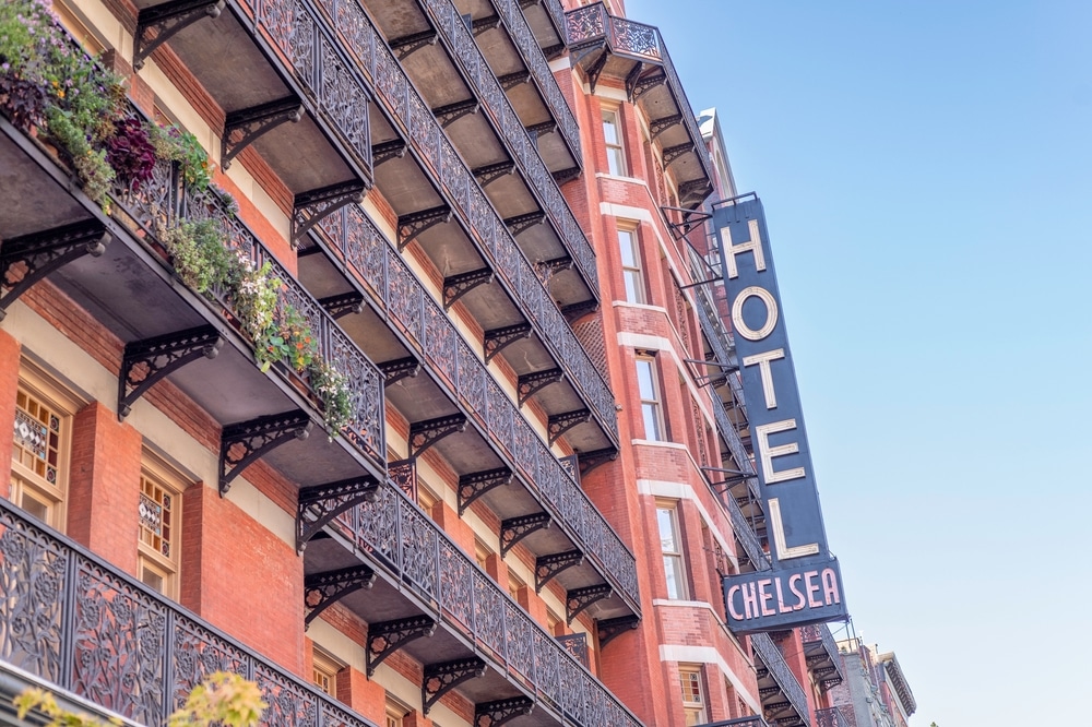 The Chelsea Hotel facade features wrought iron balconies.