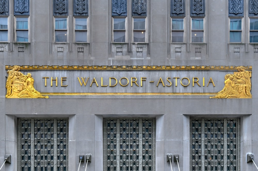 Facade of the Waldorf Astoria, one of NYC's historic hotels.