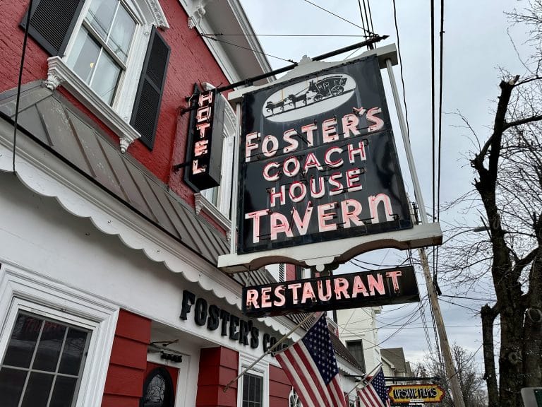 Neon sign outside Foster's Coach House Tavern, a historic restaurant in Rhinebeck NY